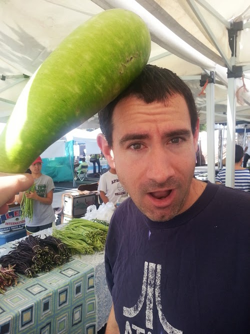 Here is an opo squash being used as a weapon. For reference, my boyfriend also has a long face, so this is a serious squash!