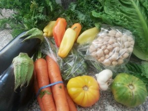 My lovely CSA box included garlic, gypsy peppers and heirlooms tomatoes