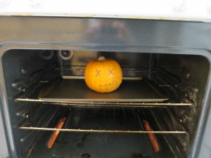 Step 2 - Into the oven you go, stabbed pumpkin corpse!